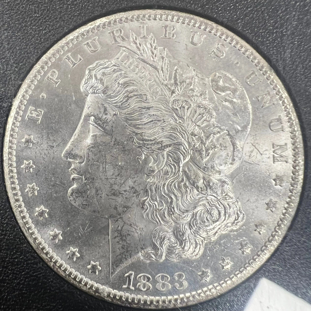 $1 1883 Carson City MS63 i kasett