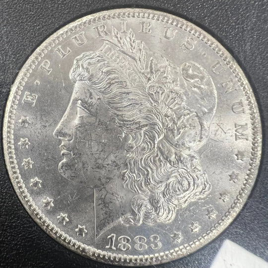 $1 1883 Carson City MS63 i kasett