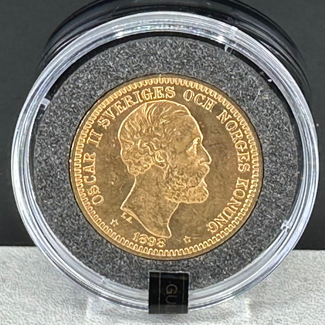 8,96g .900Au 20kr Sverige 1898 Nummert i skrin og serfikat Nr.1934/1940 Gulltransporten 70år