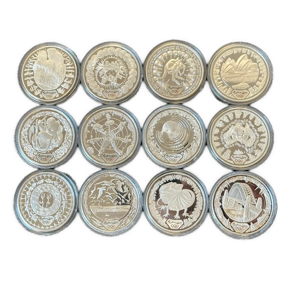 12oz .999Ag (Net) SPOT+2% Diverse minnemynter Sydney OL 2000