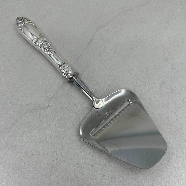 Opphøiet Rose ostehøvel m/riller 22,5cm