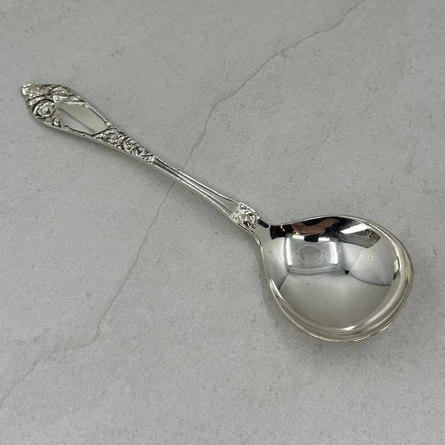 Opphøiet rose serveringsskje 18,5 cm